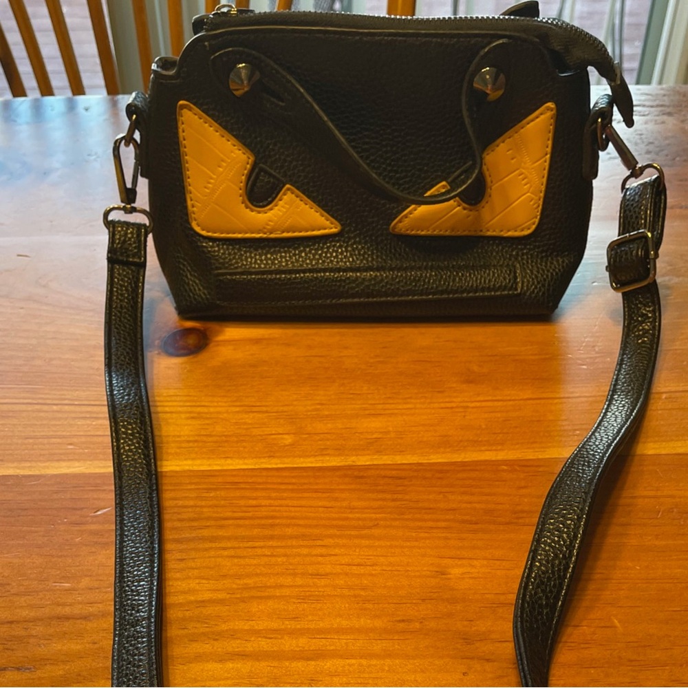 Beautiful Black and Yellow Eyes Handbag